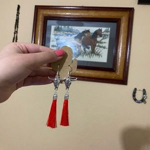 Red long horn tassel earrings